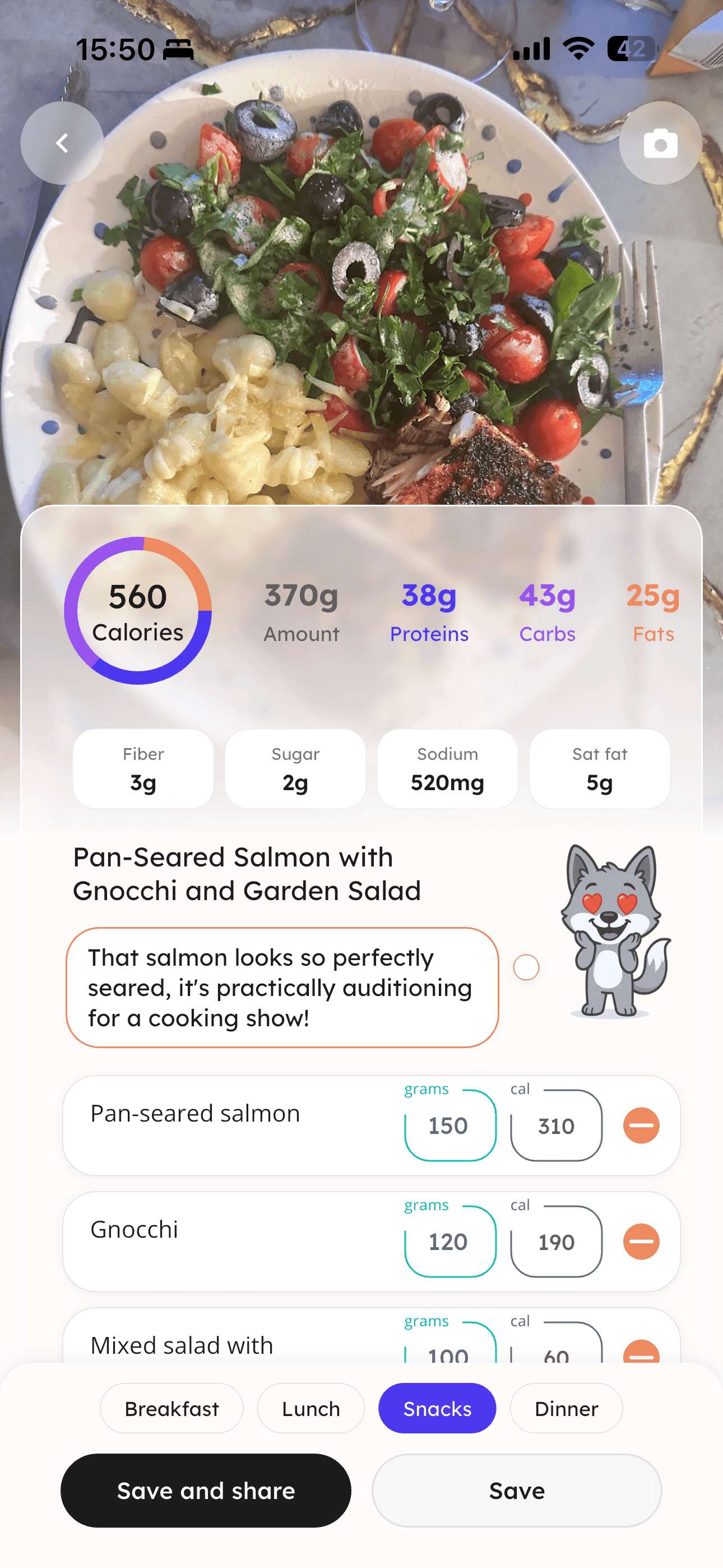 Wulfy meal scan result screen showing 560 calories for pan-seared salmon with gnocchi and garden salad